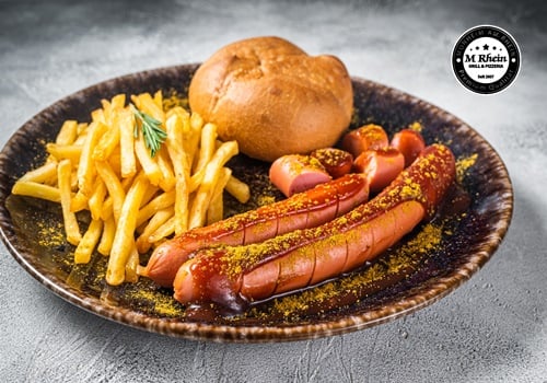 Curry Rindswurst mit Pommes 