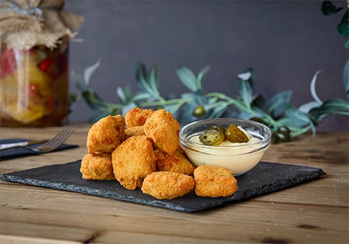 Chicken Nuggets (12 Stück) mit Jalapeno-Käse-Sauce