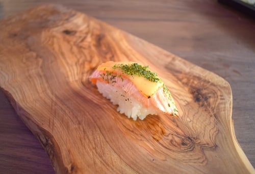 Flamed sake cheese