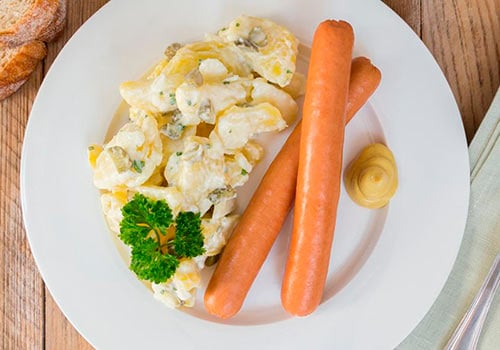 Kartoffelsalat (ohne Mayo) mit 1 Paar Geflügel Wiener Würstchen (XL)