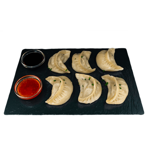 Momos in Sauce gedämpft (6 Stück)