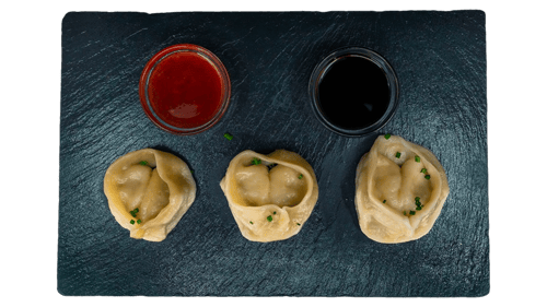 Momos gedämpft Poulet