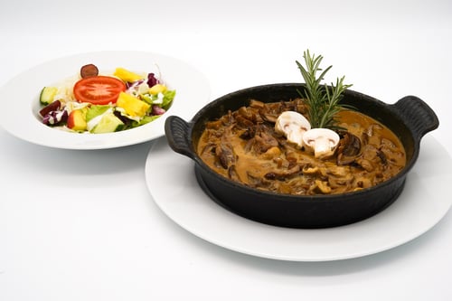 129 Großes Tigany in Cassisrahmsauce