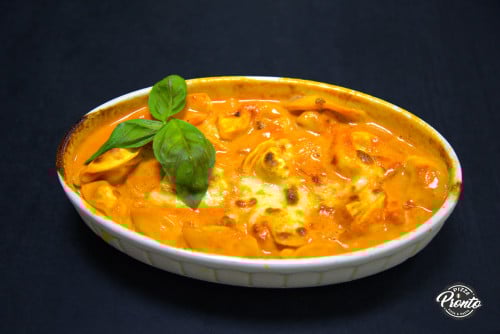Tortellini al Forno inkl. Beilagensalat Tortellini al Forno inkl. Beilagensalat
