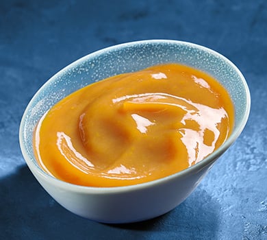 Portion fruchtige Orangen Senf Sosse