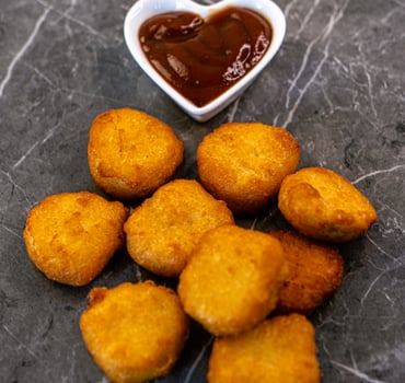 Chicken Nuggets (9 Stück) Chicken Nuggets (9 Stück)