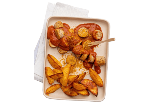 Portion Kartoffelecken mit Plant-based Currywurst