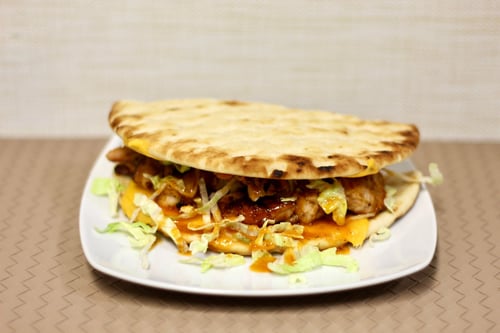 Greek pita bread with chicken thigh fillet from the charcoalgrill Greek pita bread with chicken thigh fillet from the charcoalgrill